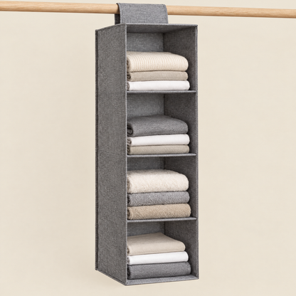 Fuho hanging wardrobe organiser on a rail with folded clothes and towels